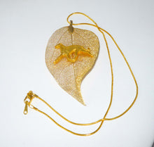 Load image into Gallery viewer, Gold Leaf Pendant with Gold Trotting Greyhound, Gold Snake Chain Necklace
